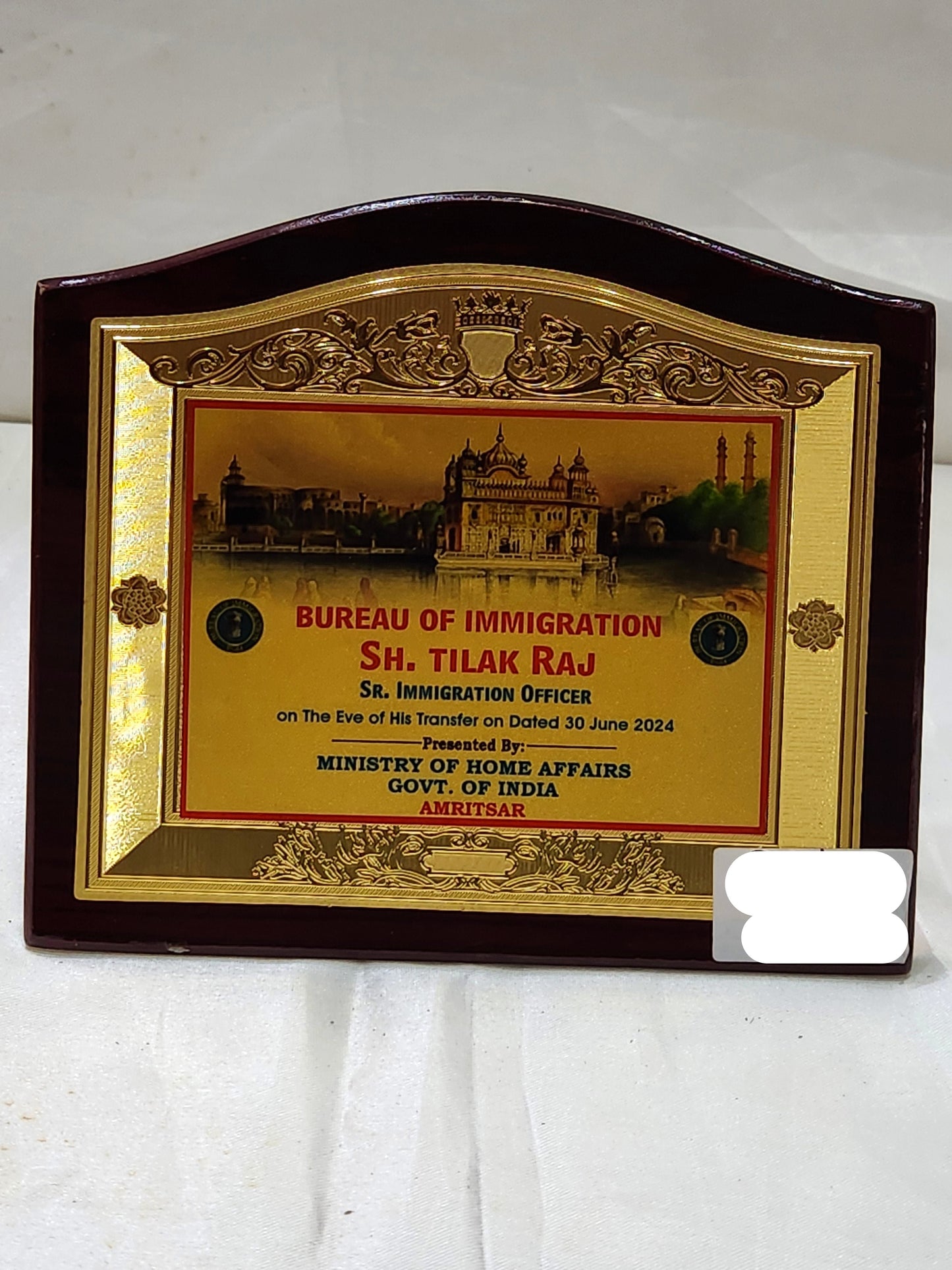 Bureau of Immigration wooden trophy